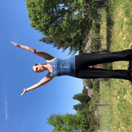 Arms raised pose